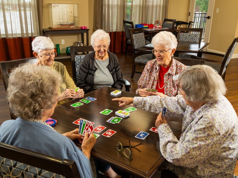 Generic Women Playing Cards Activities smiling